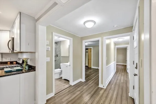 a bedroom with a large bed and a couch