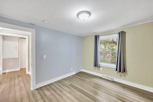 a house with trees in front of it