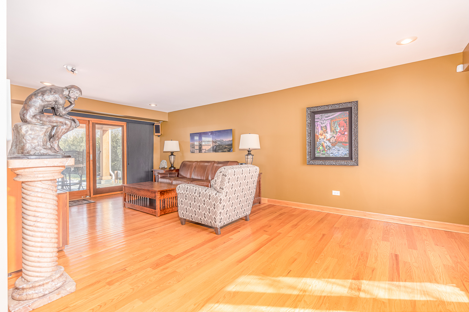 181 Queenswood Road Bolingbrook, IL 60440 - Photo 15 of 46 a living room with furniture and a flat screen tv