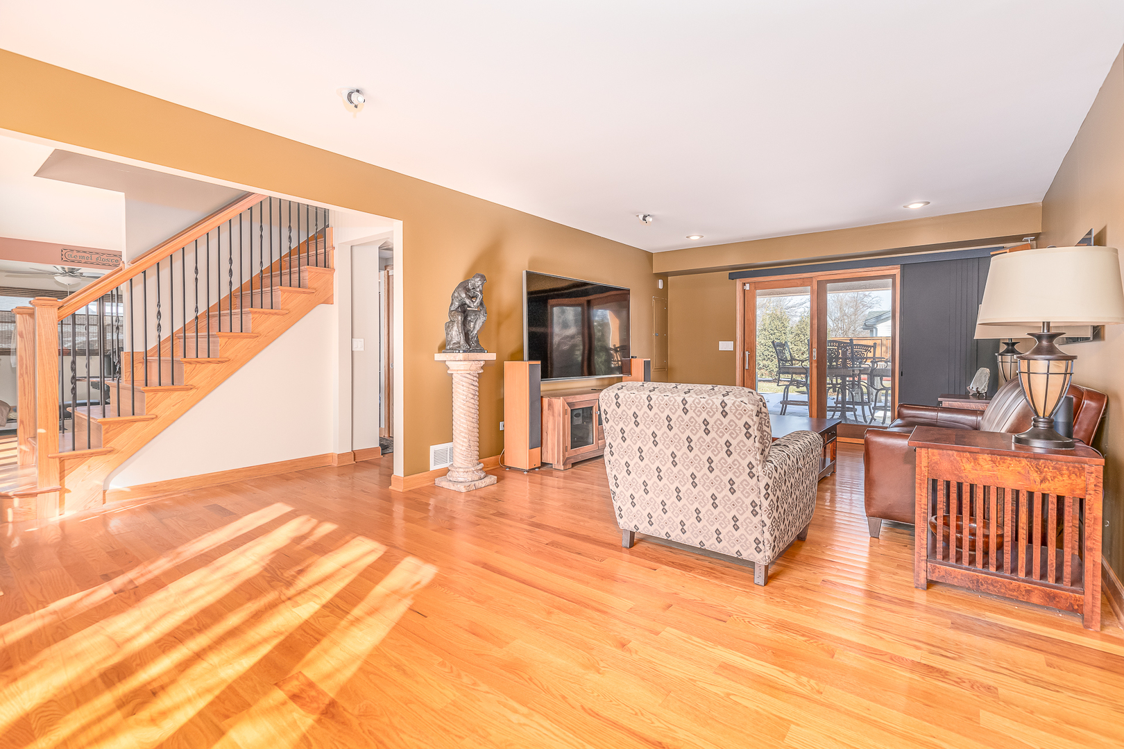 181 Queenswood Road Bolingbrook, IL 60440 - Photo 16 of 46 a living room with furniture and a large window