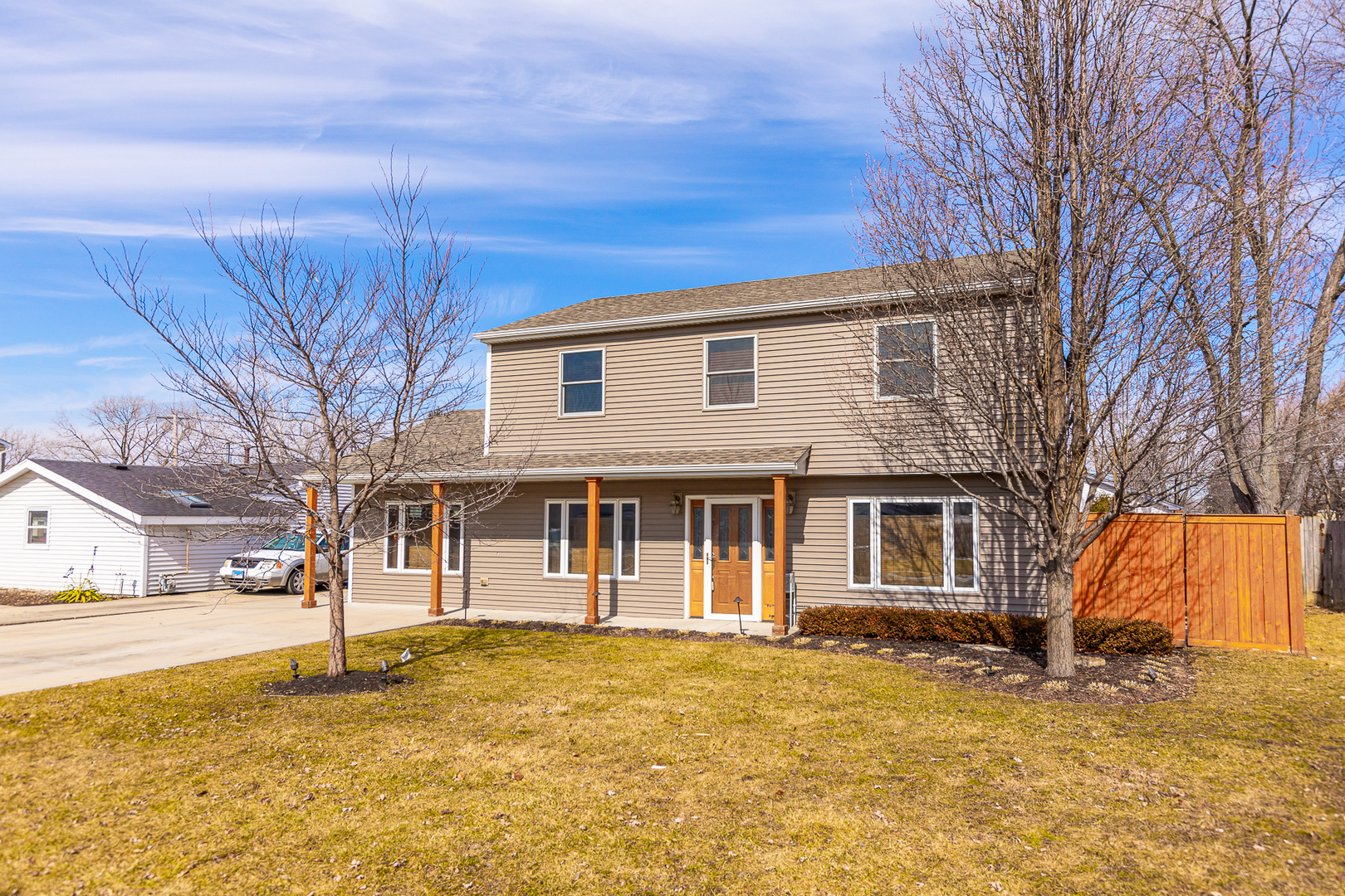181 Queenswood Road Bolingbrook, IL 60440 - Photo 2 of 46 a front view of a house with a yard