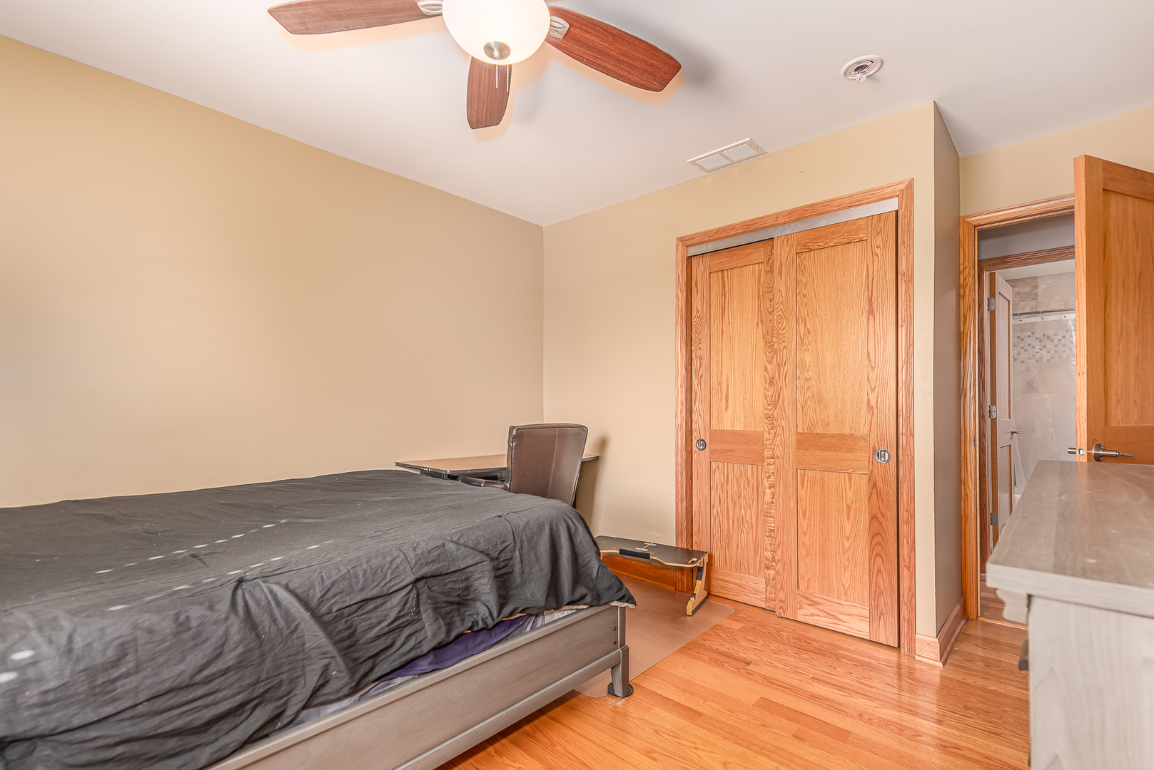 181 Queenswood Road Bolingbrook, IL 60440 - Photo 22 of 46 a bedroom with a bed and a window