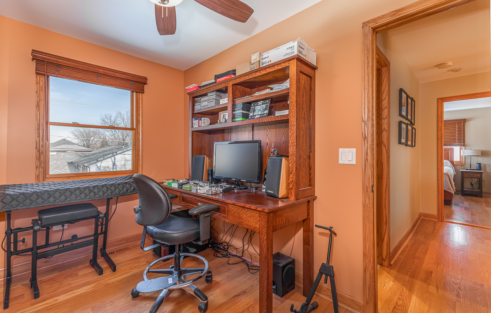 181 Queenswood Road Bolingbrook, IL 60440 - Photo 24 of 46 a workspace with furniture and chandelier