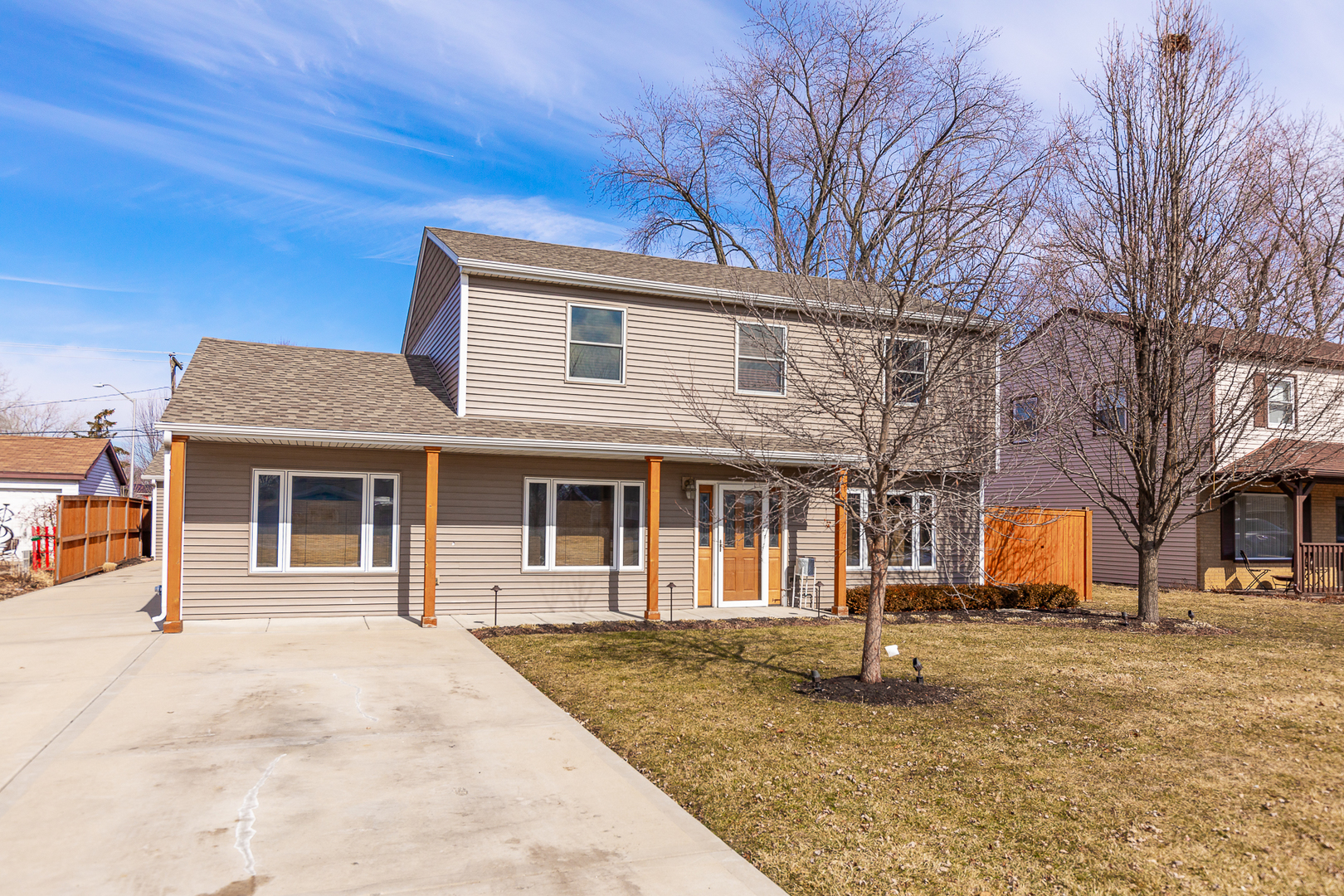 181 Queenswood Road Bolingbrook, IL 60440 - Photo 3 of 46 a front view of a house with a yard