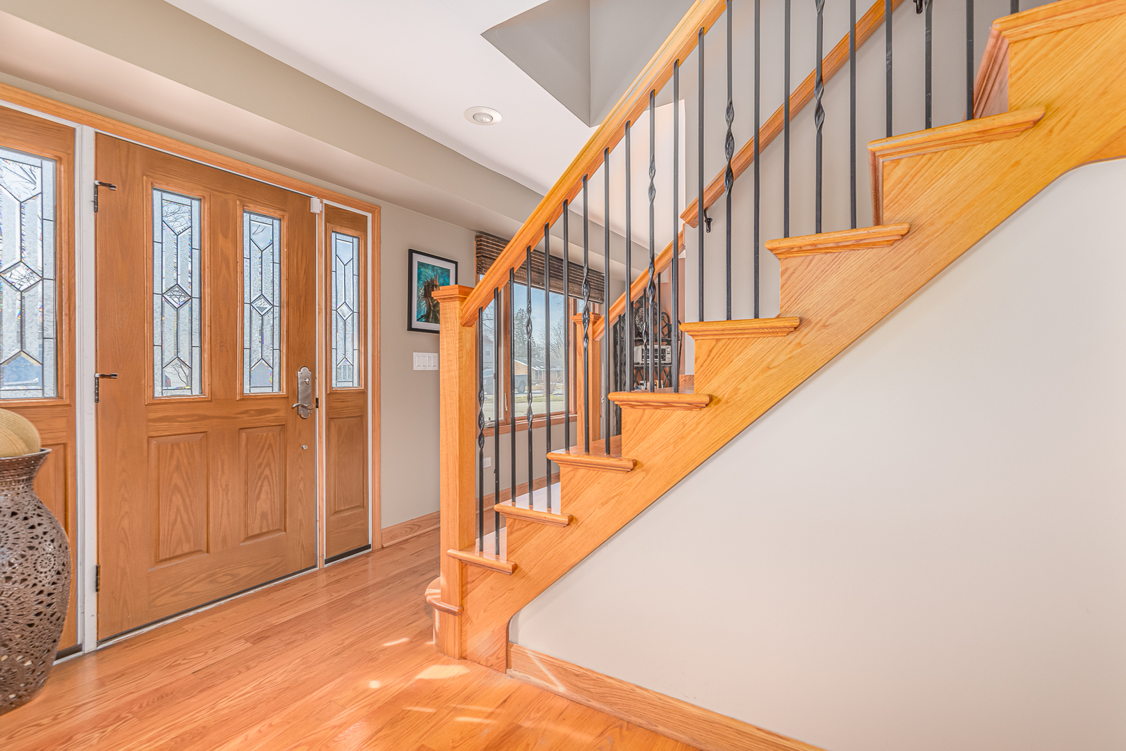 181 Queenswood Road Bolingbrook, IL 60440 - Photo 5 of 46 a view of an entryway with staircase