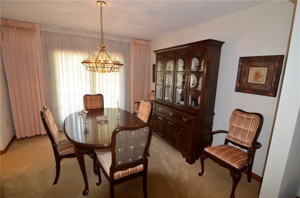 111 Hampton Court Butler, PA 16002 - Photo 9 of 25 a view of a dining room with furniture window and outside view