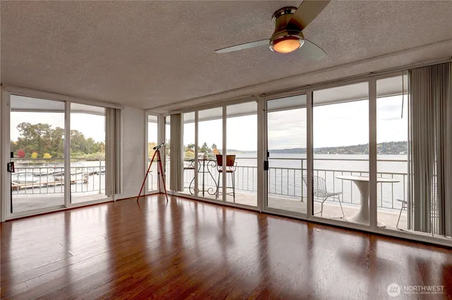 a view of an entryway with wooden floor