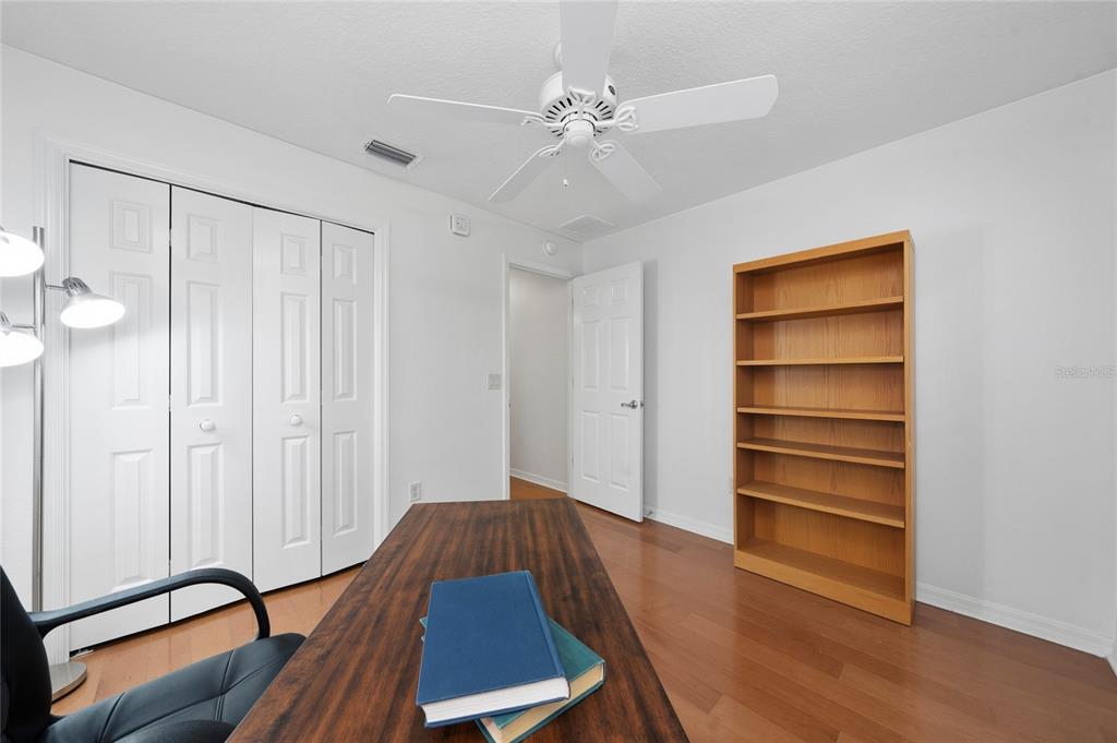 2241 Hackney Way The Villages, FL 32162 - Photo 25 of 50 a view of room with wooden floor and fan