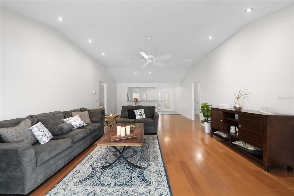 2241 Hackney Way The Villages, FL 32162 - Photo 8 of 50 a living room with furniture and a flat screen tv