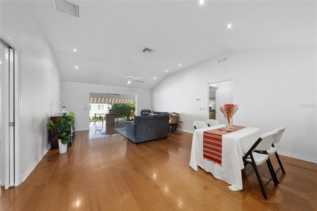 2241 Hackney Way The Villages, FL 32162 - Photo 9 of 50 a living room with furniture potted plant and a window