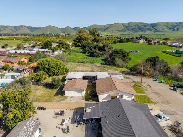 an aerial view of a house with garden