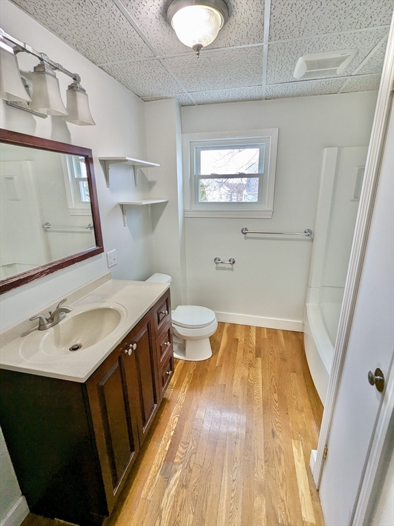 161 Webster Street, Unit 2 Malden, MA 02148 - Photo 11 of 15 a bathroom with a sink and a mirror