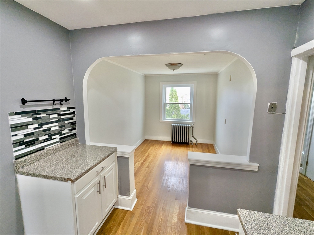 161 Webster Street, Unit 2 Malden, MA 02148 - Photo 4 of 15 a view of kitchen and living room