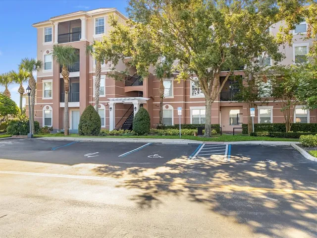 a street view with residential building in front of it