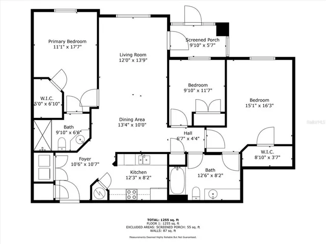 an aerial view of residential houses with outdoor space and a lake view