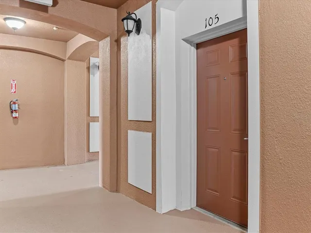 a view of hallway with shower