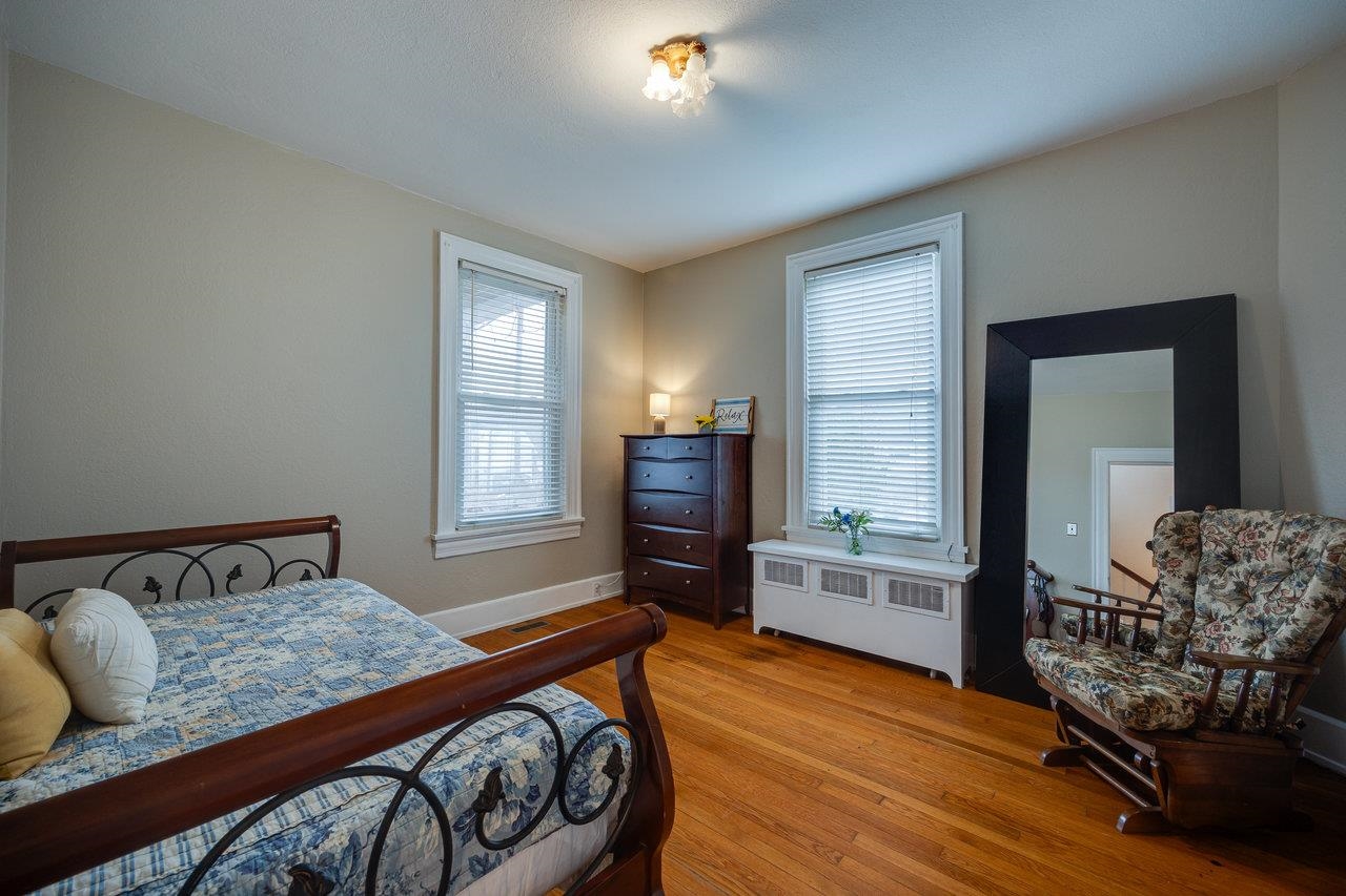 515 Fourth Street Shenandoah, VA 22849 - Photo 17 of 51 a bedroom with furniture and wooden floor