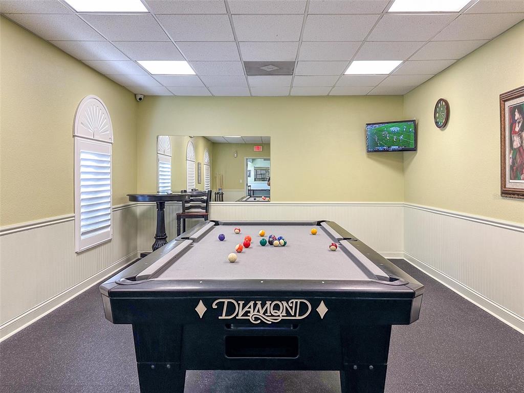 3797 Autumn Amber Dr Spring Hill Spring Hill, FL 34609 - Photo 42 of 44 a view of a room with furniture window and wooden floor