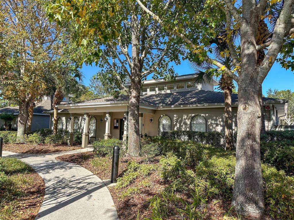 3797 Autumn Amber Dr Spring Hill Spring Hill, FL 34609 - Photo 44 of 44 a view of a house with a tree in a yard