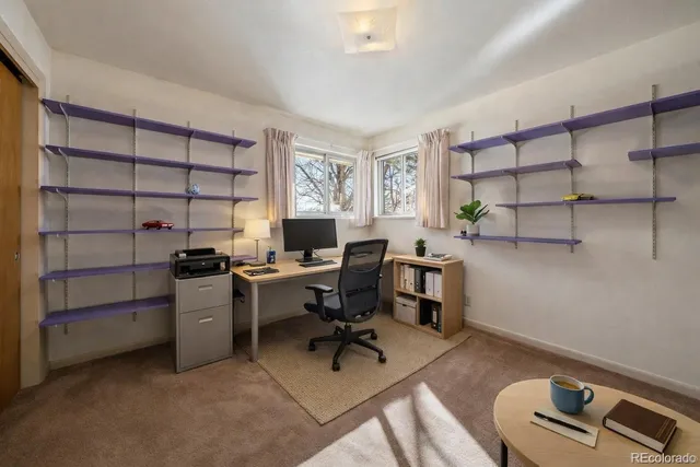 a view of a room with racks on the wall