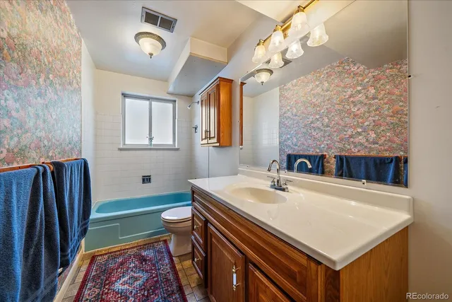 a view of balcony with wooden floor