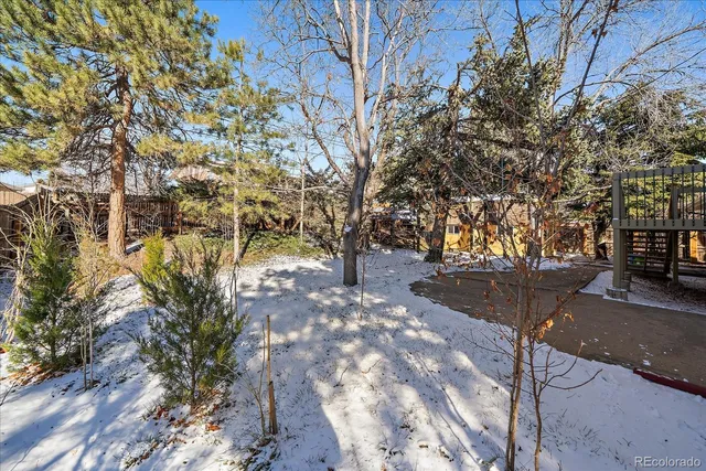 a view of empty room with wooden walls