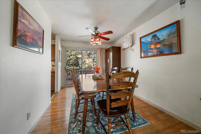 a kitchen with stainless steel appliances a refrigerator a sink a stove and cabinets