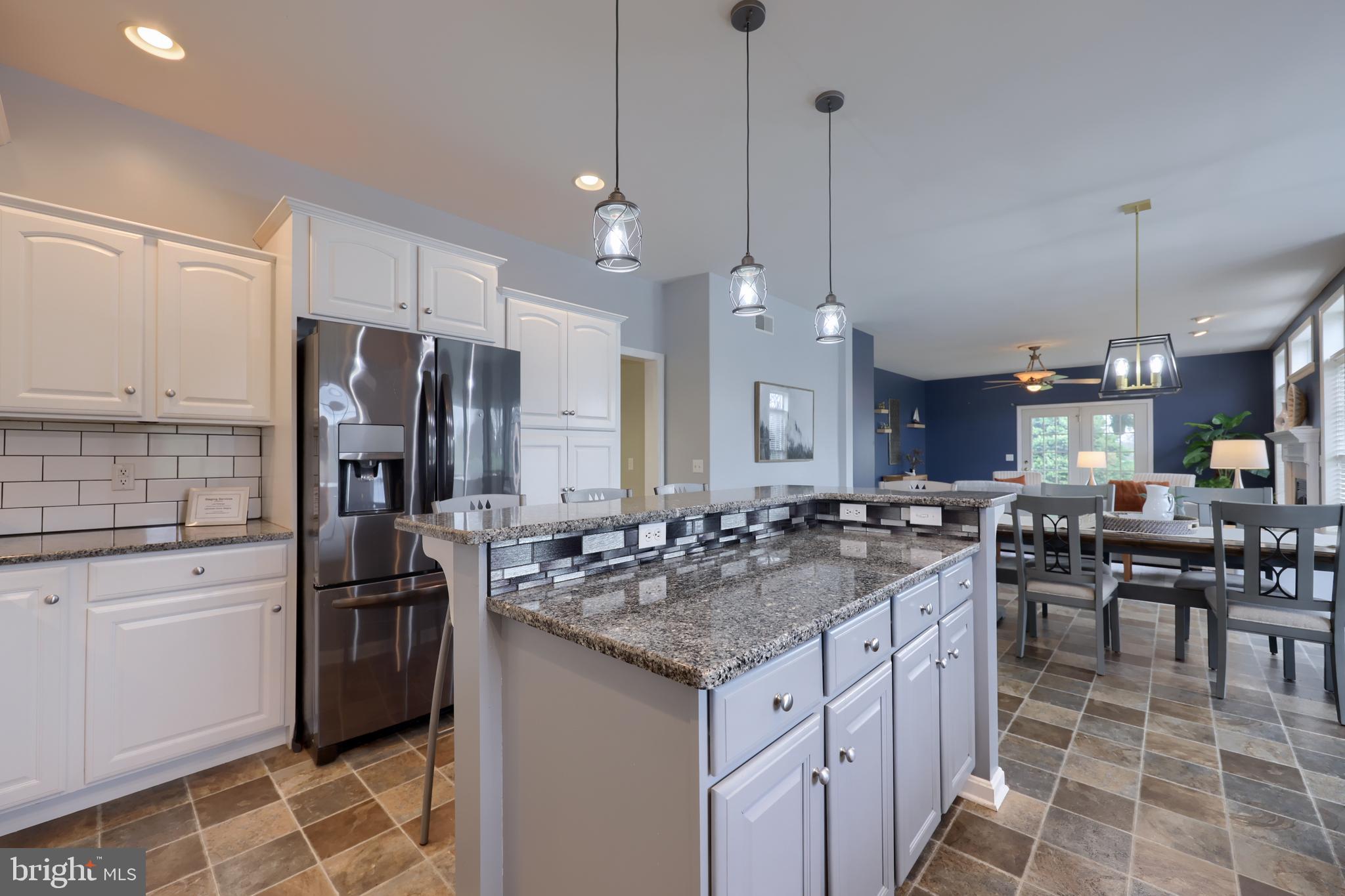 1860 Windy Hill Road Lancaster, PA 17602 - Photo 29 of 71 a kitchen with granite countertop a sink stove and refrigerator