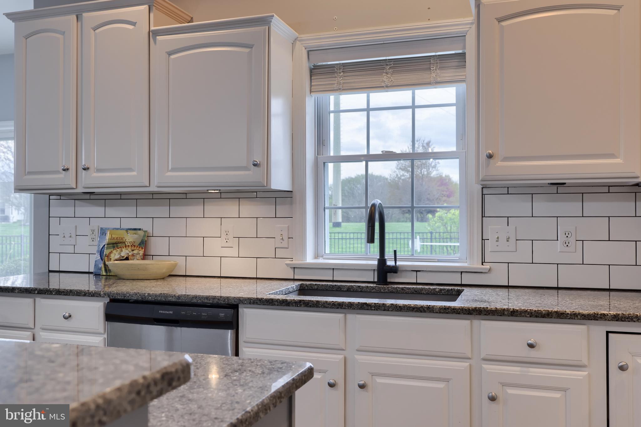 1860 Windy Hill Road Lancaster, PA 17602 - Photo 31 of 71 a kitchen with stainless steel appliances granite countertop white cabinets and a window