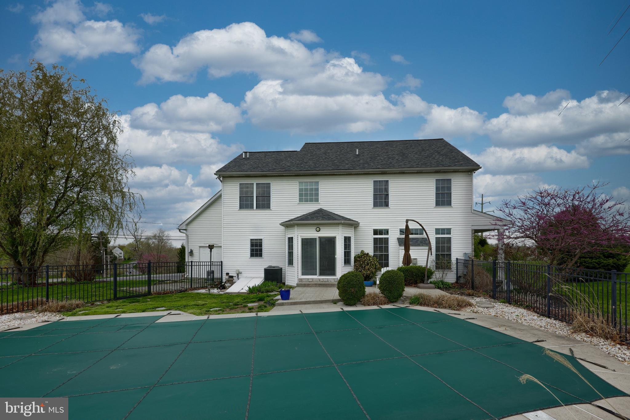 1860 Windy Hill Road Lancaster, PA 17602 - Photo 5 of 71 a front view of a house with garden