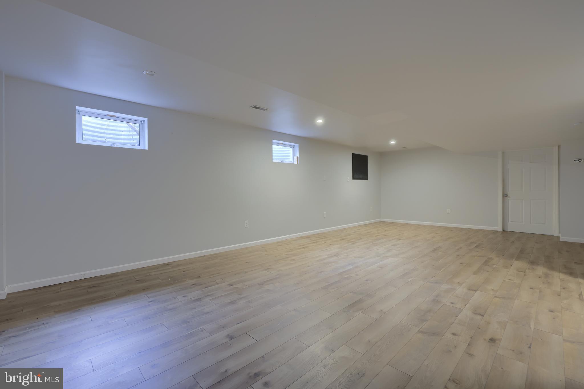 1860 Windy Hill Road Lancaster, PA 17602 - Photo 61 of 71 a view of an empty room with wooden floor and a window