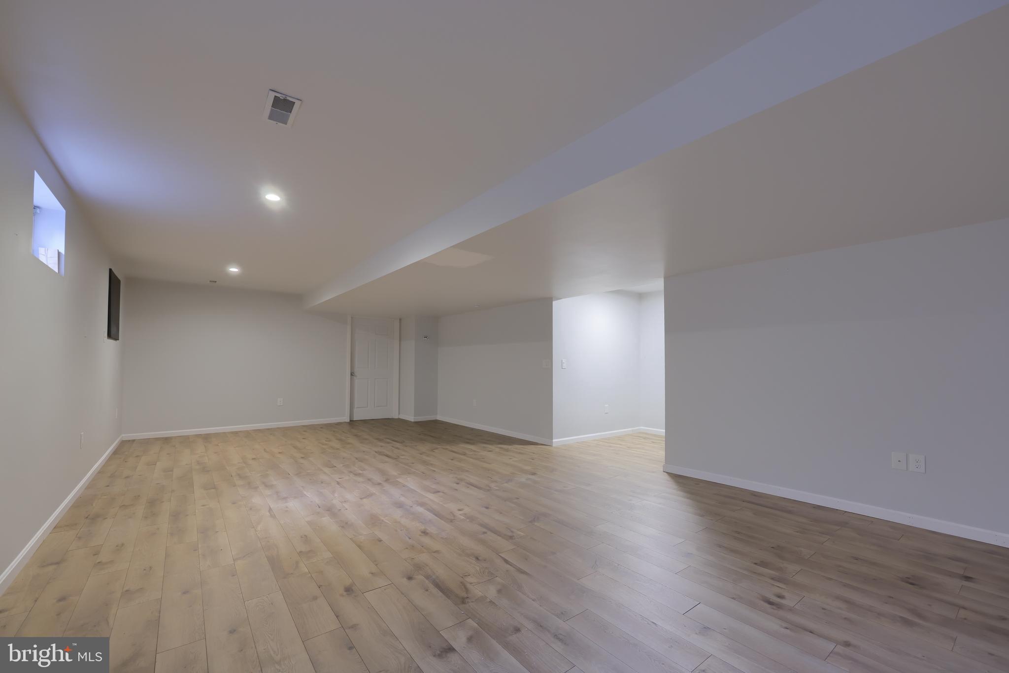 1860 Windy Hill Road Lancaster, PA 17602 - Photo 62 of 71 a view of an empty room with wooden floor