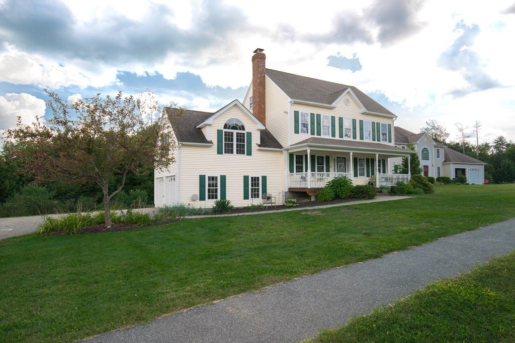 15 Winifreds Way Rutland, MA 01543 - Photo 2 of 30 a front view of a house with a yard