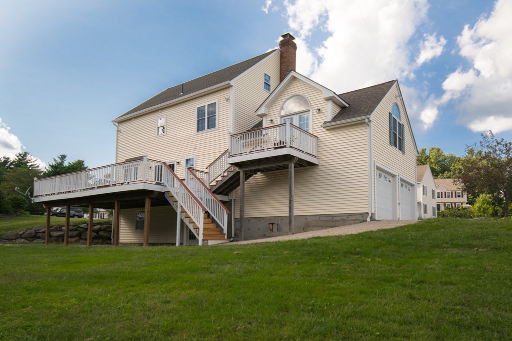 15 Winifreds Way Rutland, MA 01543 - Photo 30 of 30 a front view of house with yard and green space