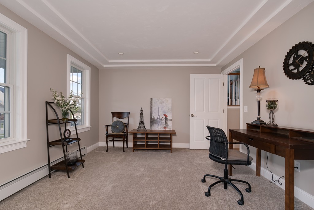 15 Winifreds Way Rutland, MA 01543 - Photo 10 of 30 a view of a workspace with furniture and a window