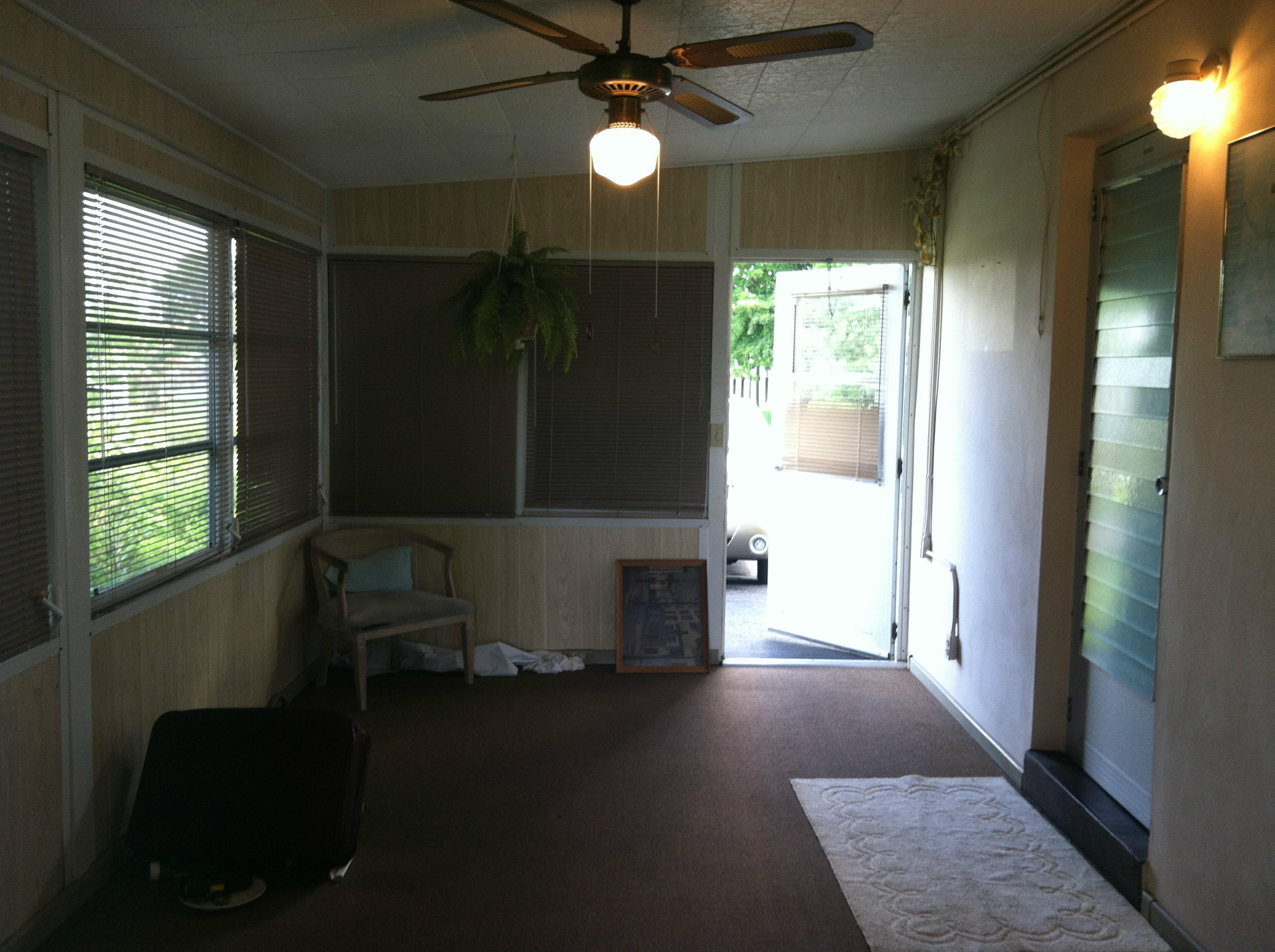 5596 South Rue Road West Palm Beach, FL 33415 - Photo 13 of 21 FLORIDA ROOM- FRONT DOOR TO DRIVEWAY