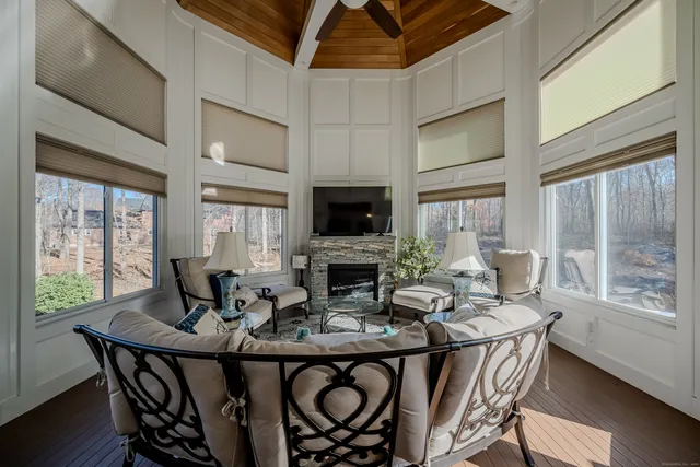 a view of a dining room with furniture window and outside view