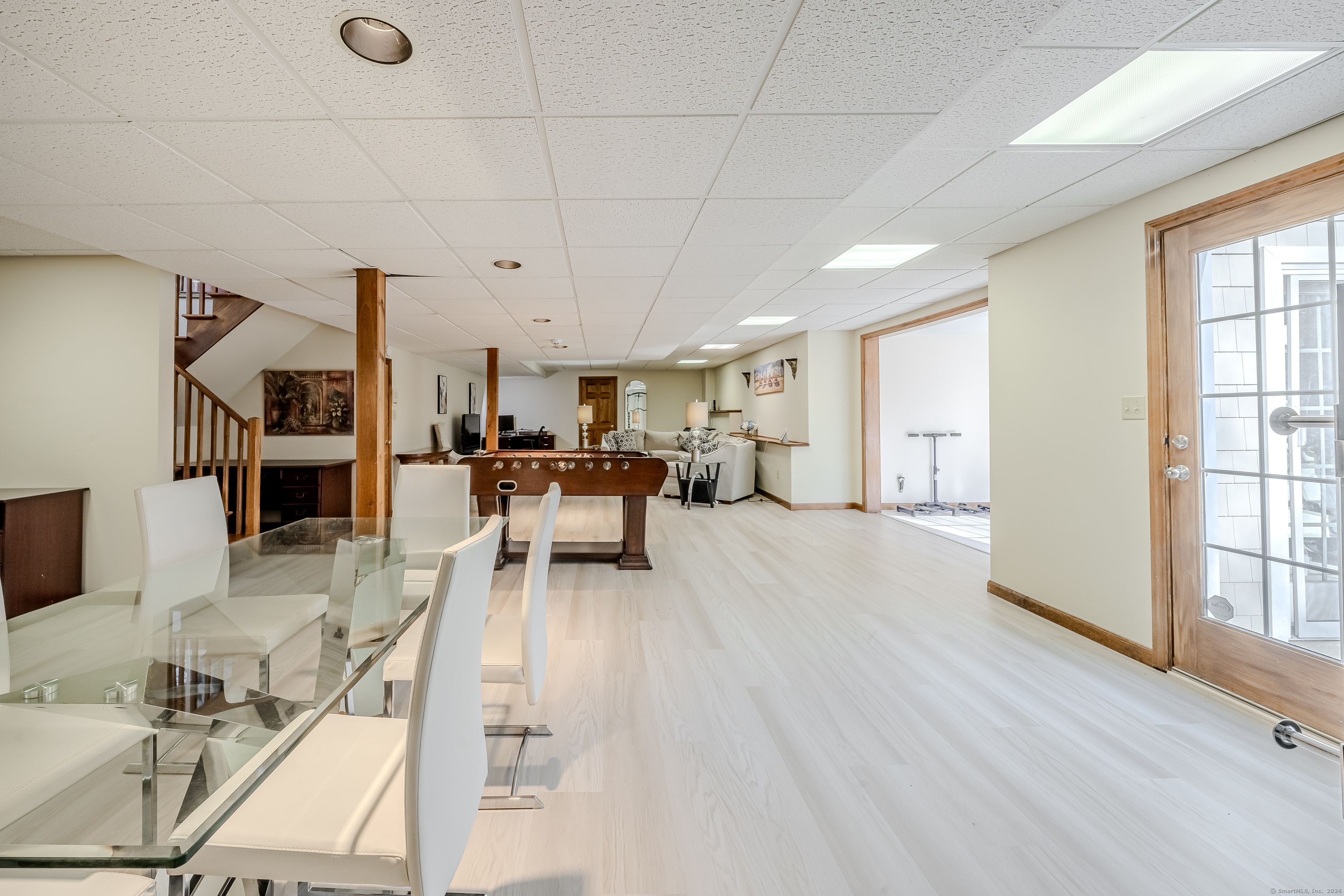 723 Laurie Lane Orange, CT 06477 - Photo 31 of 39 a living room with furniture and a wooden floor