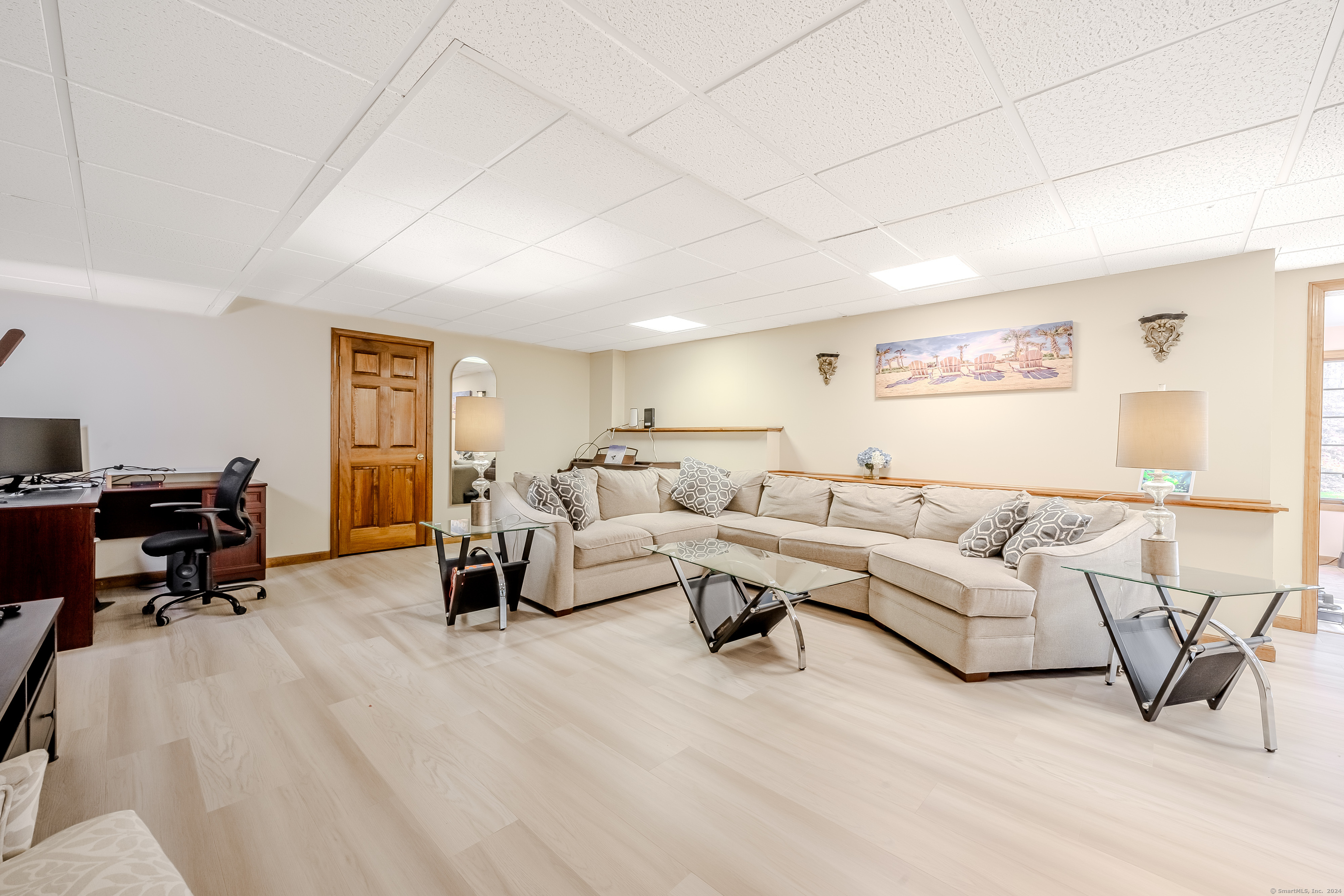 723 Laurie Lane Orange, CT 06477 - Photo 33 of 39 a living room with furniture and a large window