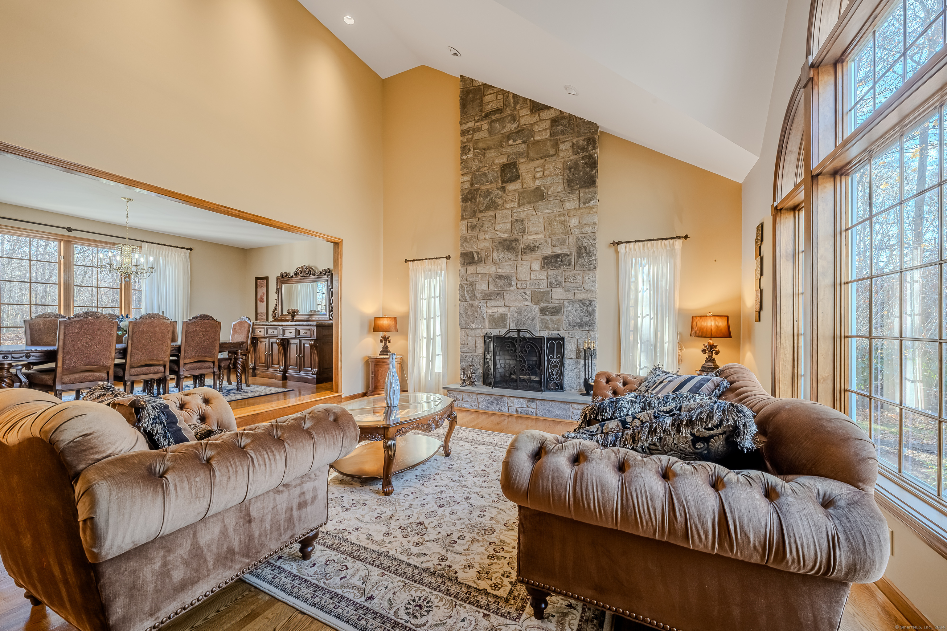 723 Laurie Lane Orange, CT 06477 - Photo 7 of 39 a living room with furniture fireplace and a fireplace