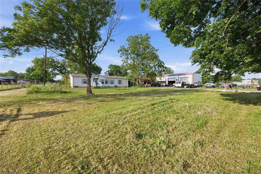 2449 East Fm 120 Denison, TX 75021 - Photo 3 of 30 a view of a field with sitting area