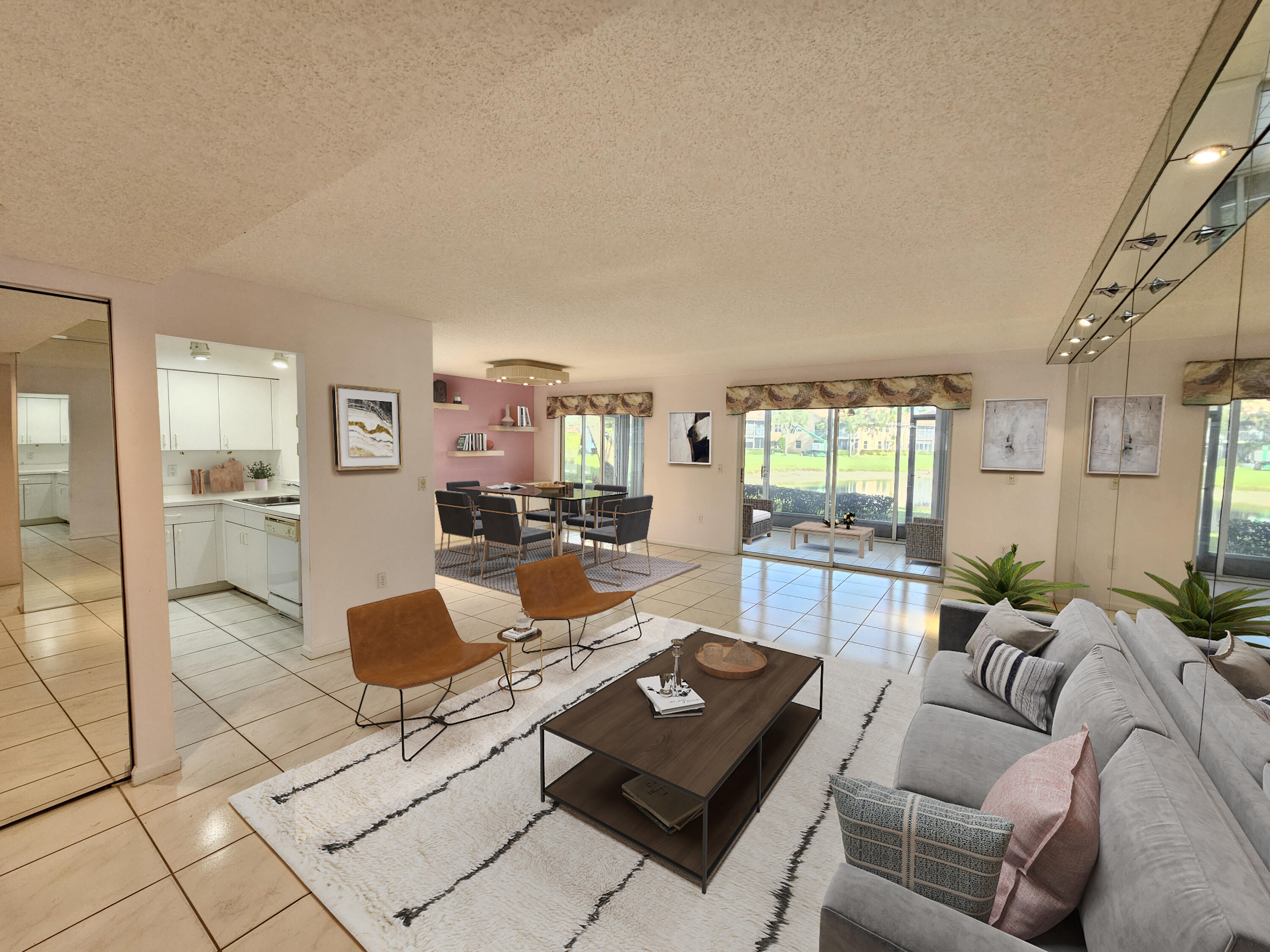 9963 Seacrest Circle, Unit 101 Boynton Beach, FL 33437 - Photo 2 of 27 a living room with furniture and a table