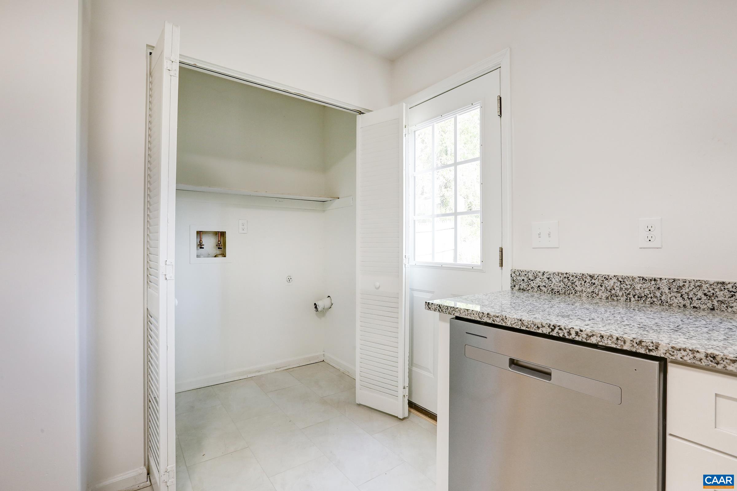 605 Bailey Road Charlottesville, VA 22903 - Photo 11 of 25 a bathroom with a granite countertop sink and window