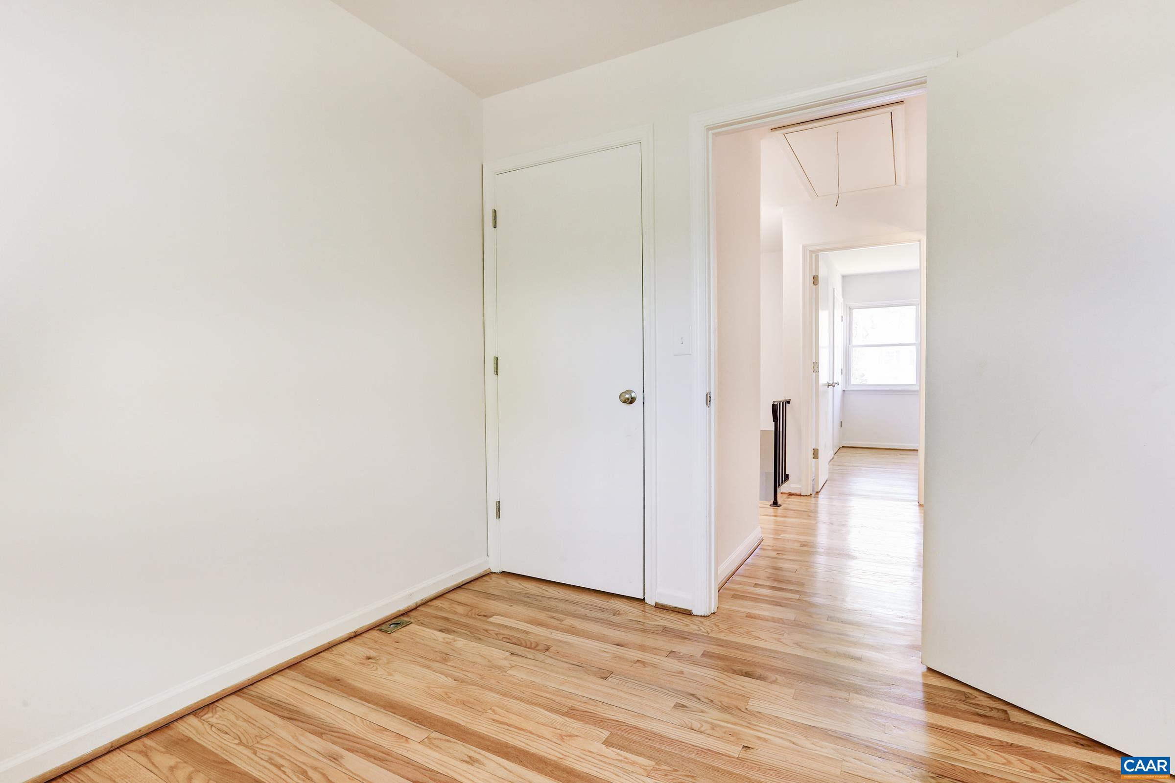 605 Bailey Road Charlottesville, VA 22903 - Photo 20 of 25 a view of a hallway with wooden floor