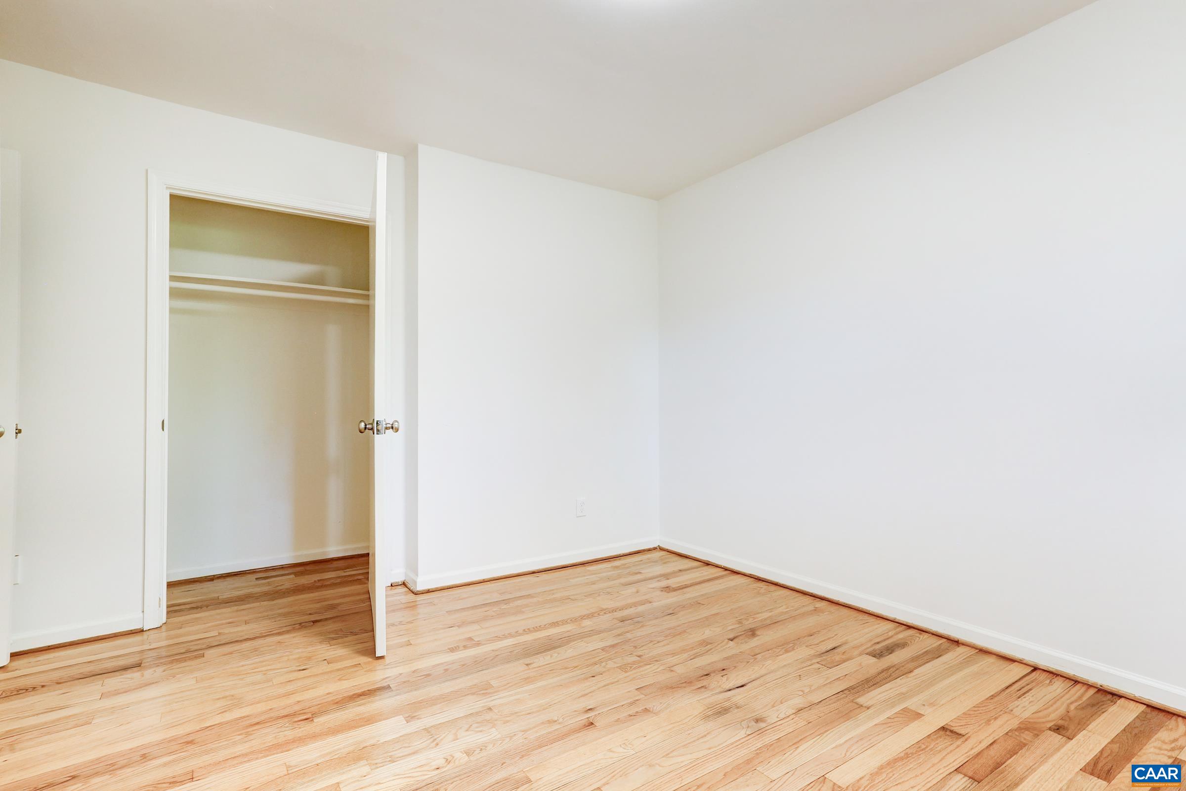 605 Bailey Road Charlottesville, VA 22903 - Photo 22 of 25 a view of empty room with wooden floor