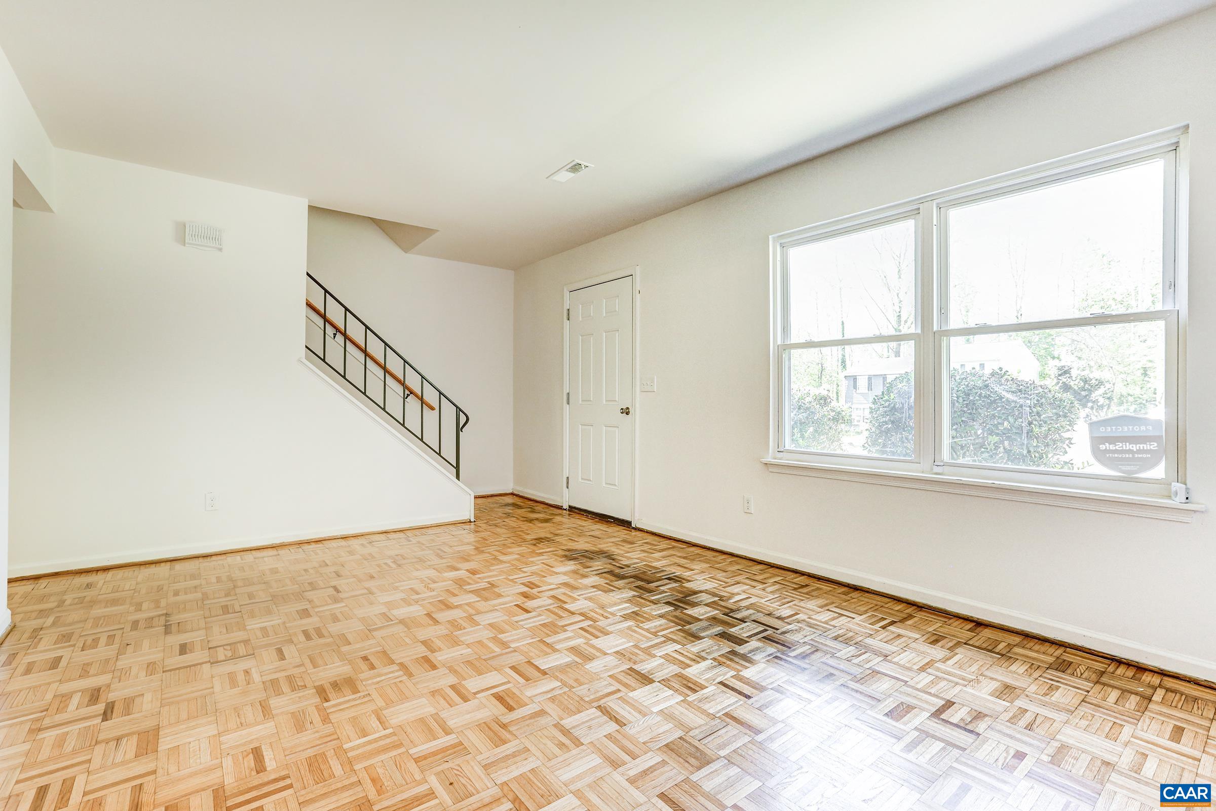 605 Bailey Road Charlottesville, VA 22903 - Photo 6 of 25 a view of an empty room with a window