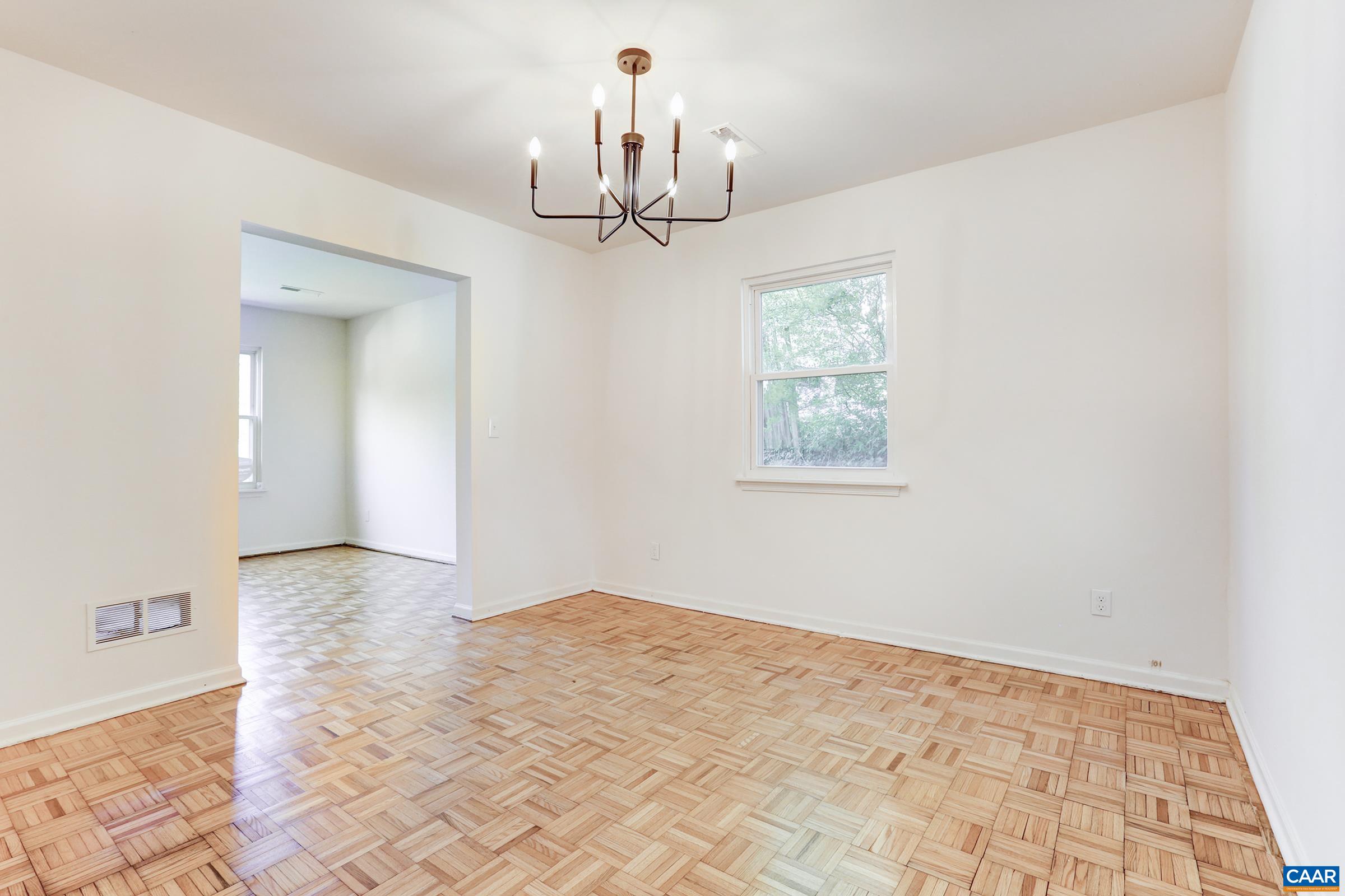 605 Bailey Road Charlottesville, VA 22903 - Photo 8 of 25 a view of an empty room with a window