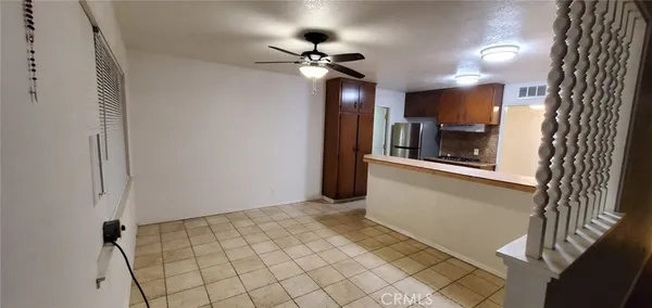 a view of a kitchen with a sink