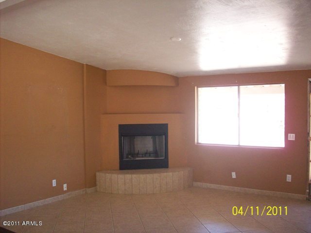 3243 West Massingale Road Tucson, AZ 85741 - Photo 3 of 8 Great Room with Fireplace