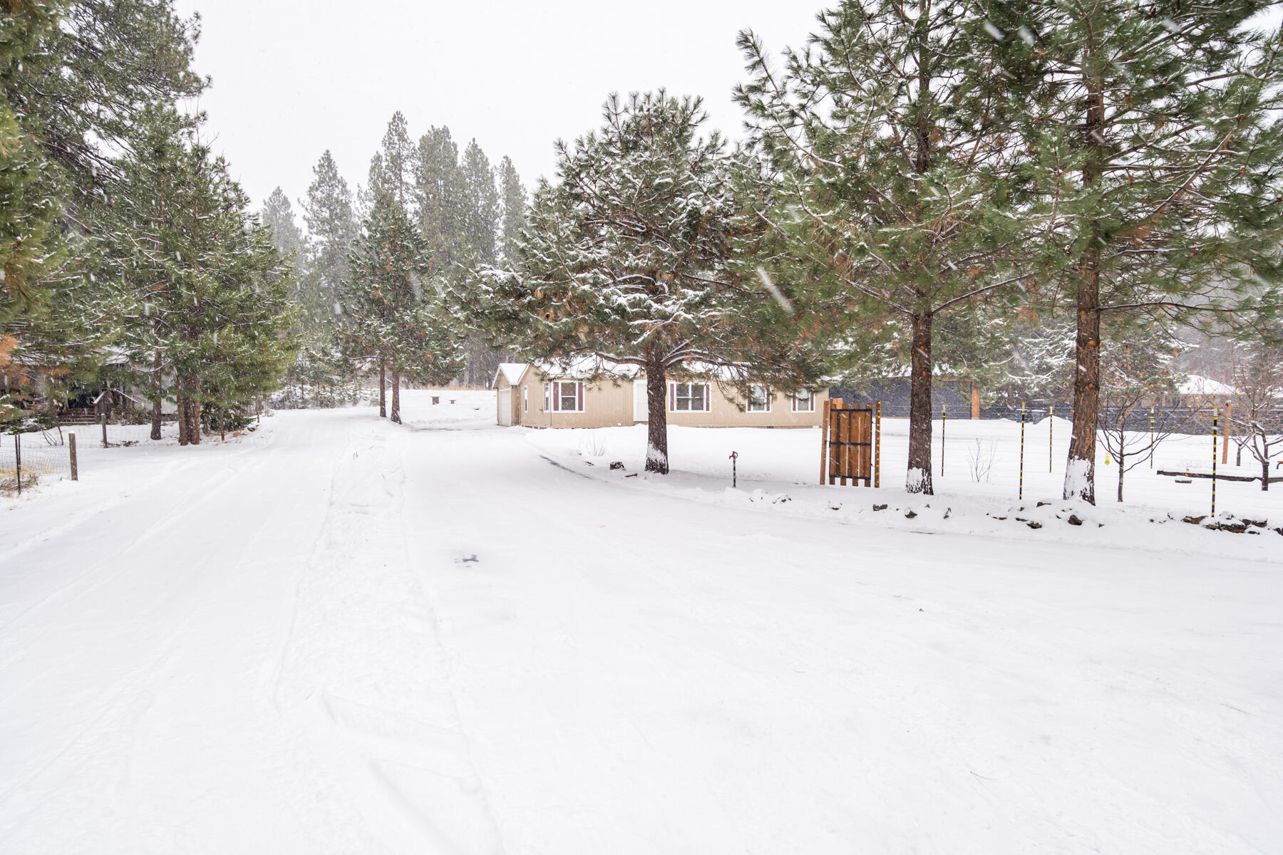 19271 Indian Summer Road Bend, OR 97702 - Photo 48 of 48 a street view covered with snow